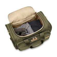 Load image into Gallery viewer, Briggs & Riley Baseline Underseat Duffle - Olive
Image of Angled Front Panel View with zipped open main compartment so show spacious packing capability. 
Height	     Width	     Depth	    Weight
US	10.5 in.	16.5 in.	11.5 in.	2.8 lbs.
EU	26.7 cm	41.9 cm	29.2 cm	1.3 kg