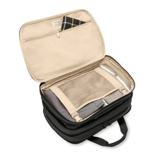 Load image into Gallery viewer, Briggs & Riley Baseline Expandable Cabin Bag - Black
Image of Spacious Packing Compartment featuring premium garment panel which envelops your clothing for minimal creasing and reduces shifting in transit
Height	   Width	     Depth	    Weight
US	11 in.	17 in.	8 in.	        3 lbs.
EU	27.9 cm	43.2 cm	20.3 cm	1.4 kg