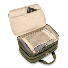 Load image into Gallery viewer, Briggs & Riley Baseline Expandable Cabin Bag - Olive
Image of Spacious Packing Compartment featuring premium garment panel which envelops your clothing for minimal creasing and reduces shifting in transit
Height	   Width	     Depth	    Weight
US	11 in.	17 in.	8 in.	        3 lbs.
EU	27.9 cm	43.2 cm	20.3 cm	1.4 kg