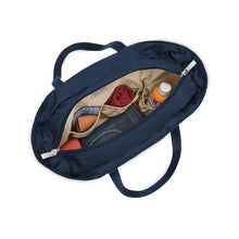 Load image into Gallery viewer, Briggs & Riley Baseline Travel Tote - Navy
Image of Front Angled View, shown unzipped with organized interior packing
Height	     Width	     Depth	     Weight
US	13 in.      21 in.       7.5 in.     1.6 lbs.
EU	33 cm    53.3 cm	19.1 cm	0.7 kg