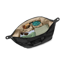 Load image into Gallery viewer, Briggs & Riley Baseline Weekender Duffle - Black
Image of Duffle zipped open. Side flaps securely cinch down with clasps, to reduce items from shifting in transit.  Also showing spacious interior packing capability.
Height	    Width	    Depth	    Weight
US	15.5 in.	20 in.     9 in.	      2.5 lbs.
EU	39.4 cm	50.8 cm	22.9 cm	1.1 kg