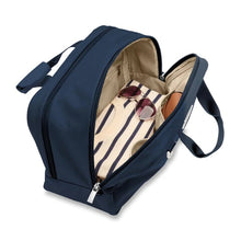 Load image into Gallery viewer, Briggs & Riley Baseline Executive Travel Duffle - Navy
Image of Front Angled View with Front Compartment shown zipped open to illustrate the organizational pockets and spacious packing capacity
Height	      Width   Depth	     Weight
US	10.5 in.	16.8 in.	8 in.	       2.5 lbs.
EU	26.7 cm	42.7 cm	20.3 cm	1.1 kg