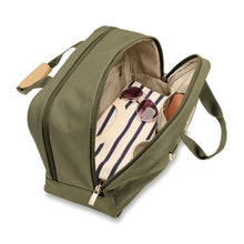 Load image into Gallery viewer, Briggs & Riley Baseline Executive Travel Duffle - Olive
Image of Front Angled View with Front Compartment shown zipped open to illustrate the organizational pockets and spacious packing capacity
Height	      Width   Depth	     Weight
US	10.5 in.	16.8 in.	8 in.	       2.5 lbs.
EU	26.7 cm	42.7 cm	20.3 cm	1.1 kg