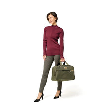 Load image into Gallery viewer, Briggs & Riley Baseline Executive Travel Duffle - Olive
Image of female model carrying this Briggs & Riley Baseline Executive Travel Duffle
Height	      Width   Depth	     Weight
US	10.5 in.	16.8 in.	8 in.	       2.5 lbs.
EU	26.7 cm	42.7 cm	20.3 cm	1.1 kg
