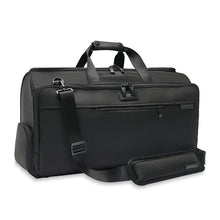 Load image into Gallery viewer, Briggs & Riley Baseline Garment Duffle - Black
Image of Front Angled View with detachable shoulder strap
Height	Width	Depth	Weight
US	12.5 in.	22 in.	9 in.	4.2 lbs.
EU	31.8 cm	55.9 cm	22.9 cm	2 kg