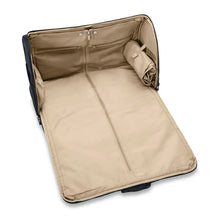 Load image into Gallery viewer, Briggs & Riley Baseline Garment Duffle - Black
Image of Interior View shown zipped open.  Garment sleeve shown in zipped closed postion
Height	Width	Depth	Weight
US	12.5 in.	22 in.	9 in.	4.2 lbs.
EU	31.8 cm	55.9 cm	22.9 cm	2 kg