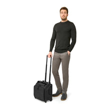 Load image into Gallery viewer, Briggs & Riley Baseline 2-Wheel Cabin Bag - Black
Image of 2-Wheel Cabin Bag being wheeled by male model.
Height	   Width	     Depth	     Weight
US	13.5 in.	15.5 in.	9.5 in.	6.5 lbs.
EU	34.3 cm	39.4 cm	24.1 cm	3 kg
