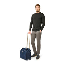 Load image into Gallery viewer, Briggs & Riley Baseline 2-Wheel Cabin Bag - Navy
Image of 2-Wheel Cabin Bag shown with male model.
Height	   Width	     Depth	     Weight
US	13.5 in.	15.5 in.	9.5 in.	6.5 lbs.
EU	34.3 cm	39.4 cm	24.1 cm	3 kg