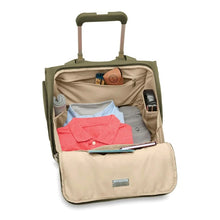 Load image into Gallery viewer, Briggs & Riley Baseline 2-Wheel Cabin Bag - Olive
Image of Main Compartment zipped open showing ample packing space.
Height	   Width	     Depth	     Weight
US	13.5 in.	15.5 in.	9.5 in.	6.5 lbs.
EU	34.3 cm	39.4 cm	24.1 cm	3 kg