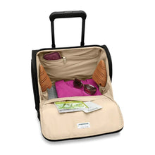 Load image into Gallery viewer, Briggs & Riley Baseline Cabin Spinner - Black
Image of Front Angled View with Main Compartment zipped open to show spacious packing compartment.
Height	    Width	    Depth	      Weight
US	16 in.	14 in.	9.5 in.	7 lbs.
EU	40.6 cm	35.6 cm	24.1 cm	3.3 kg