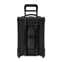 Load image into Gallery viewer, Briggs & Riley Baseline Essential 2-Wheel Carry-On - Black
Image of Back Panel View, showing Power Pocket.  Allows for carrying your smart phone and charging device to charge your phone on the go
Height	    Width	    Depth	     Weight
US	22 in.	14 in.	9 in.	        9.7 lbs.
EU	55.9 cm	35.6 cm	22.9 cm	4.4 kg
