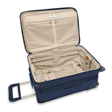 Load image into Gallery viewer, Briggs & Riley Baseline Essential 2-Wheel Carry-On - Navy
Image of Main Packing Compartment shown in expanded position
Height	     Width	     Depth	     Weight
US	22 in.	14 in.	9 in.	        9.7 lbs.
EU	55.9 cm	35.6 cm	22.9 cm	4.4 kg