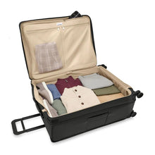 Load image into Gallery viewer, Briggs & Riley Baseline Extra Large Expandable Spinner - Black
Image of Main Packing Compartment shown in non-expanded view.  Also showing two mesh pockets on lid packing compartment.
Height	    Width	     Depth	    Weight
US 31 in.	     22 in.	      13.8 in.     15.6 lbs.
EU 78.7 cm	55.9 cm	35.1 cm	7.1 kg
