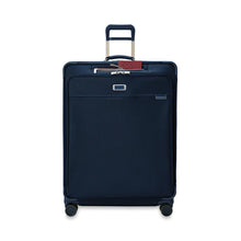 Load image into Gallery viewer, Briggs & Riley Baseline Extra Large Expandable Spinner - Navy
Image of Front Panel View and SpeedThru™ pocket which provides convenient access to your stored items at security checkpoints. Signature orange lining visually informs you that the pocket is open
Height	    Width	     Depth	    Weight
US 31 in.	     22 in.	      13.8 in.     15.6 lbs.
EU 78.7 cm	55.9 cm	35.1 cm	7.1 kg