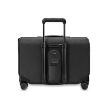 Load image into Gallery viewer, Briggs & Riley Wide Carry-On Garment Spinner - Black
Image of Back Panel View. Also showing the Power Pocket which allows space for a battery charger and smart phone to charge your phone on the go.
Height Width Depth Weight
US 16 in. 21 in. 9 in. 11.9 lbs.
EU 40.6 cm 53.3 cm 22.9 cm 5.4 kg