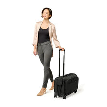 Load image into Gallery viewer, Briggs & Riley Wide Carry-On Garment Spinner - Black
Image of Bag of this bag being wheeled by female model.
Height Width Depth Weight
US 16 in. 21 in. 9 in. 11.9 lbs.
EU 40.6 cm 53.3 cm 22.9 cm 5.4 kg