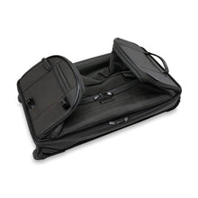Load image into Gallery viewer, Briggs & Riley Baseline Medium 2-Wheel Duffle - Black
Image of Duffle in Folded Position for convenient storage.
Height Width Depth Weight
US 27 in. 14 in. 16.5 in. 10.3 lbs.
EU 68.6 cm 35.6 cm 41.9 cm 4.7 kg
