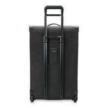 Load image into Gallery viewer, Briggs & Riley Baseline Large 2-Wheel Duffle - Black
Image of Back Panel View with Telescoping Handle Extended. Also showing retractable ID Tag
Height Width Depth Weight
US 29 in. 18 in. 16.5 in. 11.8 lbs.
EU 73.7 cm 45.7 cm 41.9 cm 5.4 kg