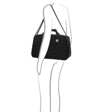 Load image into Gallery viewer, The duffle being held a drawn model.