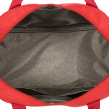 Load image into Gallery viewer, Top view of the duffle with the main compartment opened.