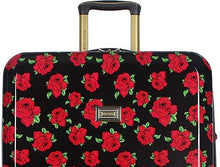 Load image into Gallery viewer, Close up to the top part of the suitcase with the telescopic handle partly pulled. Set on a white background.