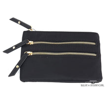 Load image into Gallery viewer, Front view of the black cosmetic bag with two zipper-closing pockets.