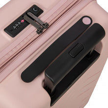 Load image into Gallery viewer, Close up to the top of the pearl pink suitcase. The view shows the telescopic handle, grabbing handle, and a three digit combination lock.