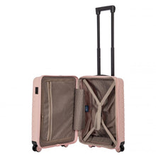 Load image into Gallery viewer, Interior view of the pearl pink hard shell suitcase with black accents. The fabric lining is light brown The front panel's side has a zipper-closing compartment. The back panel's side has a set of straps to hold contents in place.