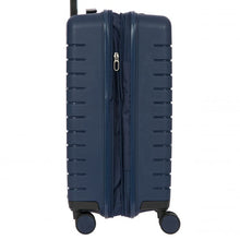 Load image into Gallery viewer, Close up to the side of the mango yellow hard shell suitcase. The expandable feature is unzipped.