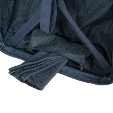 Load image into Gallery viewer, Inside view of the back panel's bottom. There is a small bag which holds another bag used to store a pair of shoes or laundry.