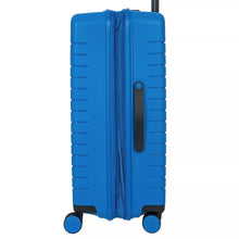 Load image into Gallery viewer, Close up to the side of the electric blue hard shell suitcase with black accents. The expandable feature is unzipped.