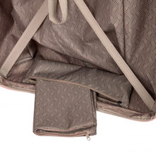 Load image into Gallery viewer, Inside view of the back panel's bottom. There is a small bag which holds another bag used to store a pair of shoes or laundry.