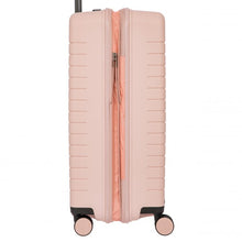 Load image into Gallery viewer, Side view of the pearl pink hard shell suitcase with black accents. The expandable feature is zipped open.