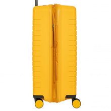 Load image into Gallery viewer, Close up to the side of the mango yellow hard shell suitcase. The expandable feature is unzipped.
