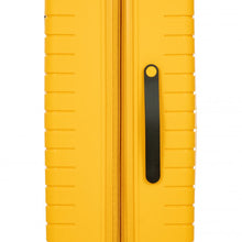 Load image into Gallery viewer, Close up to the side of the mango yellow hard shell suitcase. The black handle on it offers an easy grabbing area