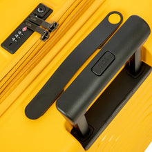 Load image into Gallery viewer, Close up to the top of the mango yellow suitcase. The view shows the telescopic handle, grabbing handle, and a three digit combination lock.