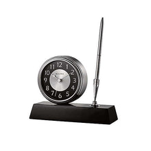 Load image into Gallery viewer, An analog Bulova clock on a black base which features a pen stand on the right side.