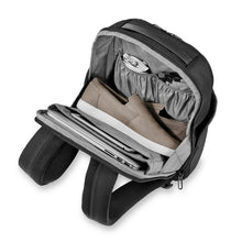 Load image into Gallery viewer, Briggs & Riley Delve Medium Backpack - Black
Image of Back Angled View with protected compartments for your laptop, tablet, and elasticized pockets for cords, cables, etc.
Dimensions:  17 x 12 x 6"
Weight:          2.3  lbs.