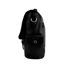 Load image into Gallery viewer, Side panel view of the black leather briefcase. It features a button-snap-closing pocket.