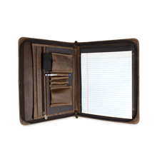 Load image into Gallery viewer, Interior view of the brown distressed leather padfolio. A notepad, pen, and cellphone are arranged in the compartments.