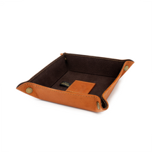 Load image into Gallery viewer, DayTrekr Leather Tray - Tan
Angled View image of Valet Tray, showing dark brown suede leather interior, contrast stitching, and antique brass hardware.
Dimensions: 6 x 6"