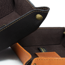 Load image into Gallery viewer, DayTrekr Leather Tray - Brown and Tan
Closeup Image of Valet Trays in both Brown and Tan. Antique brass hardware. Trays unsnap to fold flat for storage.
Dimensions: 6 x 6"