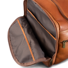 Load image into Gallery viewer, DayTrekr Leather Deluxe Duffel - Tan
Image of Zippered End Panel Pockets, fully lined and inclusive of open organizational pockets.
Dimensions:  22 x 12 x 12"