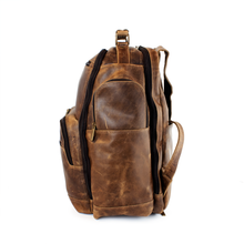 Load image into Gallery viewer, DayTrekr Distressed Leather Backpack - Brown
Image of Right-Facing side panel view with large, zippered side panel pocket
Dimensions: 15.5"W x 17"H x 8"D