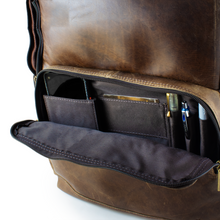 Load image into Gallery viewer, DayTrekr Distressed Leather Backpack - Brown
Image of Front Zippered Business Organizer Pocket, ideal for smart phone, cards, pens, etc.
Dimensions: 15.5"W x 17"H x 8"