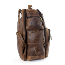 Load image into Gallery viewer, DayTrekr Distressed Leather Backpack - Brown
Image of Left-Facing side panel view with two zippered side panel pockets.
Dimensions: 15.5"W x 17"H x 8"D