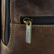 Load image into Gallery viewer, DayTrekr Distressed Leather Backpack - Brown
Closeup Image of Antique Brass Hardware.
Dimensions: 15.5"W x 17"H x 8"D