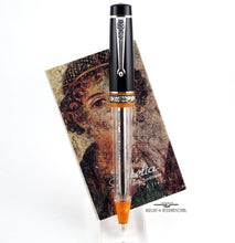 Load image into Gallery viewer, Front view of the ballpoint pen with a certificate set behind it.