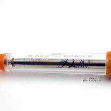 Load image into Gallery viewer, Close up to the engraved text on the pen barrel: Colosseum, Demonstrator, and the edition number.
