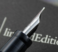 Load image into Gallery viewer, Close up to the fountain pen nib's side. It has an M engraved on it.
